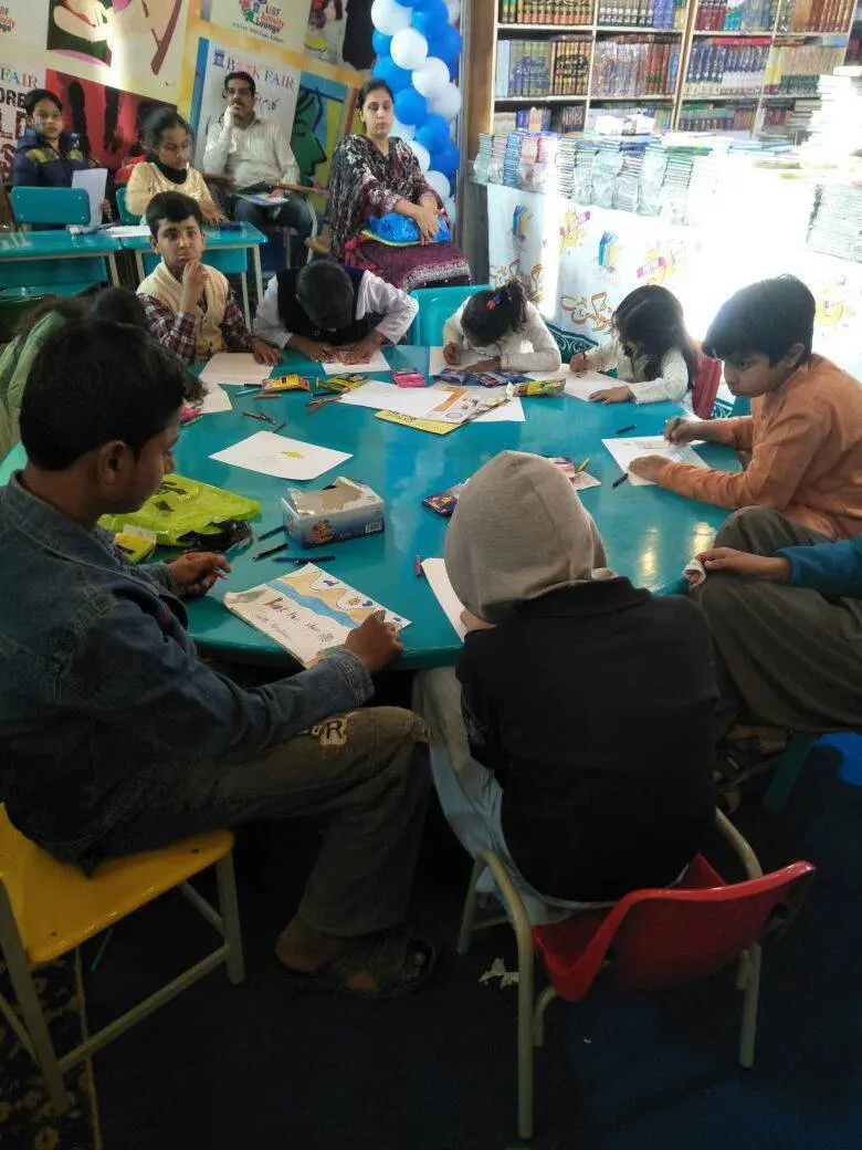 Kids engaged in activities at the book fair