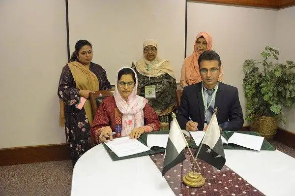 AWKUM and ICCBS Sign MoU